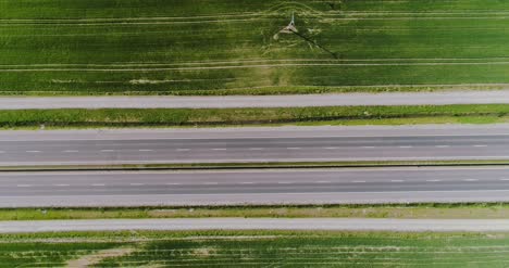 Car-Passing-Highway-Aerial-View-1