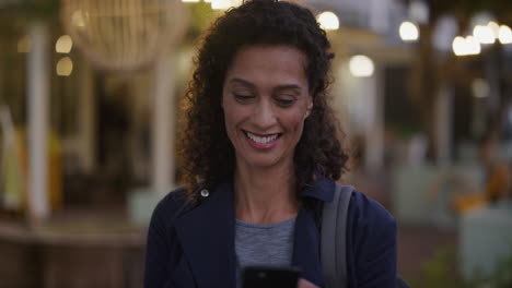 portrait-mature-professional-business-woman-using-smartphone-browsing-checking-emails-enjoying-reading-messages-on-mobile-phone-in-calm-city-evening-slow-motion