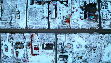 drone footage: aerial view of a snow-covered town in winter