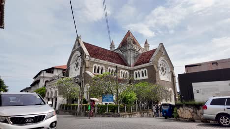 historic all saints' church located in galle fort, sri lanka, showcasing beautiful colonial architecture amidst a clear, sunny sky.