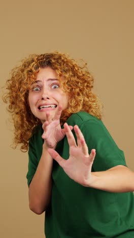 a woman reacting with intense fear or shock