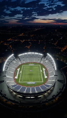 panoramic aerial sequence capturing nine stadium views during twilight, revealing illuminated urban landscape against dramatic evening sky with glowing lights