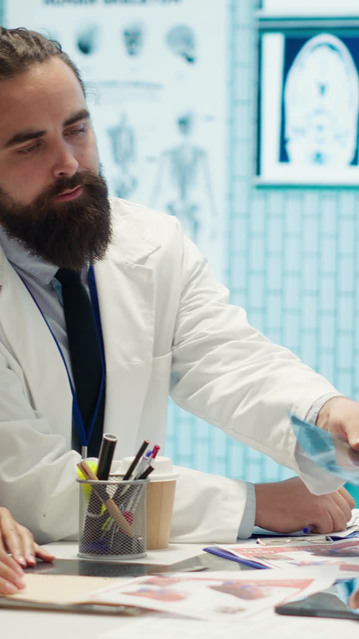 Vertical Video Healthcare experts in a meeting discussing treatment protocols