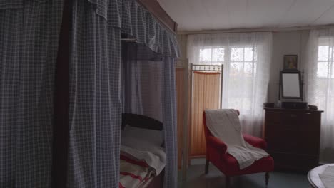 charm of traditional scandinavian design with pan shot of an old-fashioned bedroom