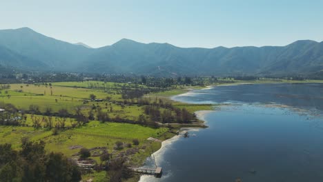 aerial view capturing the scenic beauty of aculeo lagoon and surrounding coastline in chile