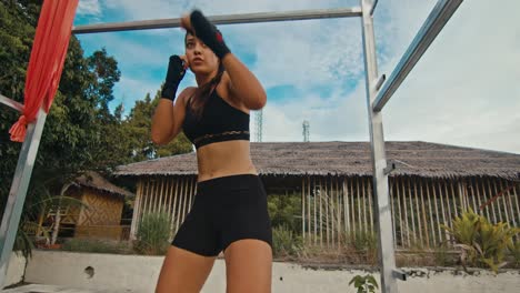 woman boxing training outdoors