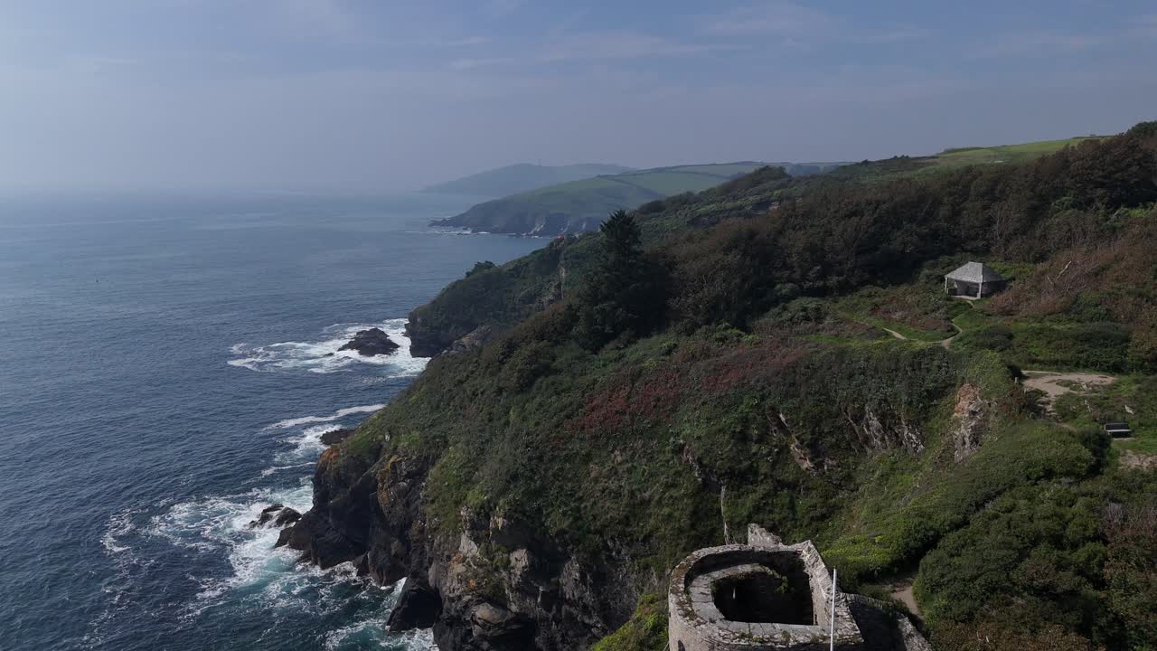 Pull back drone aerial reverse reveal St Catherine's Castle Fowey Cornwall UK