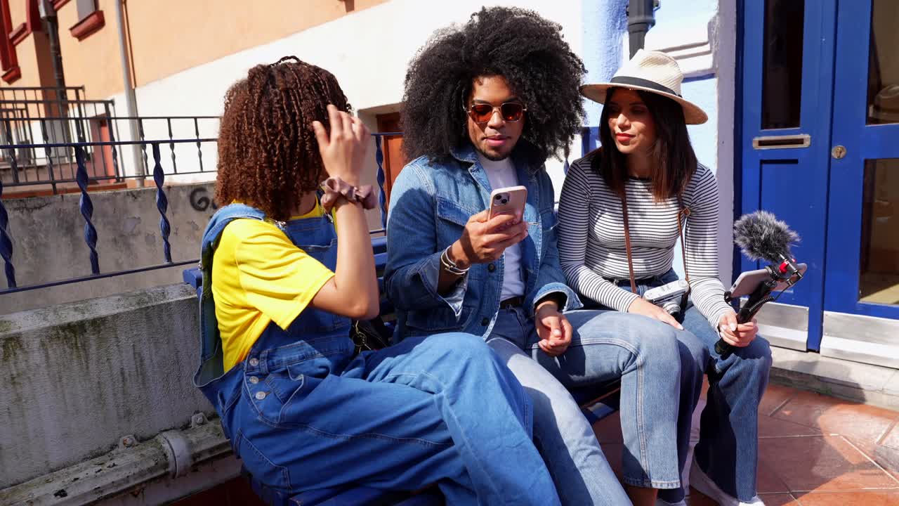 Friends vlogging outdoors