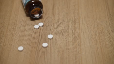 jar of pills falls to the floor