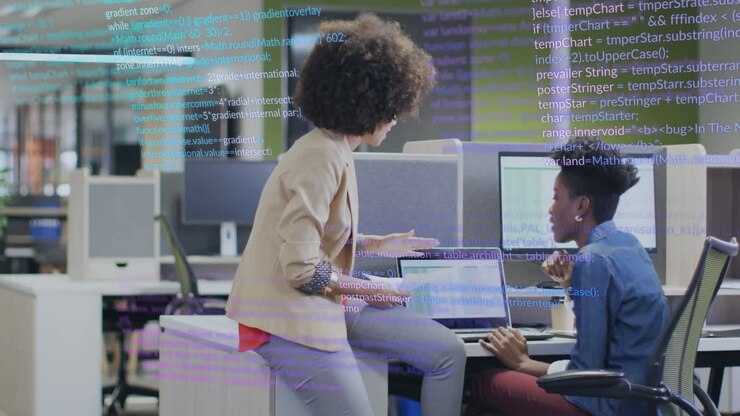 Animation of data processing over diverse female colleagues discussing work in office