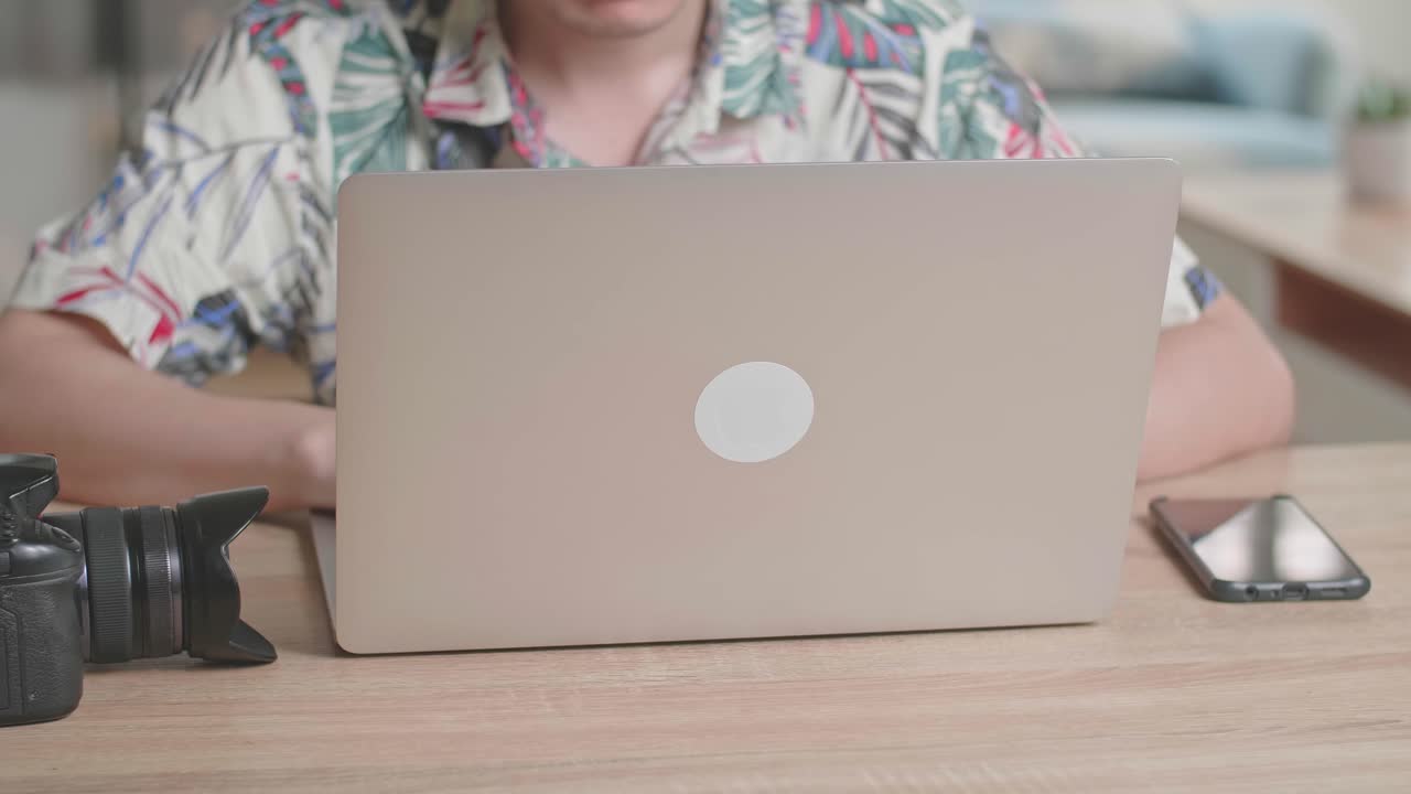 Close Up Photographer Works With Laptop Computer
