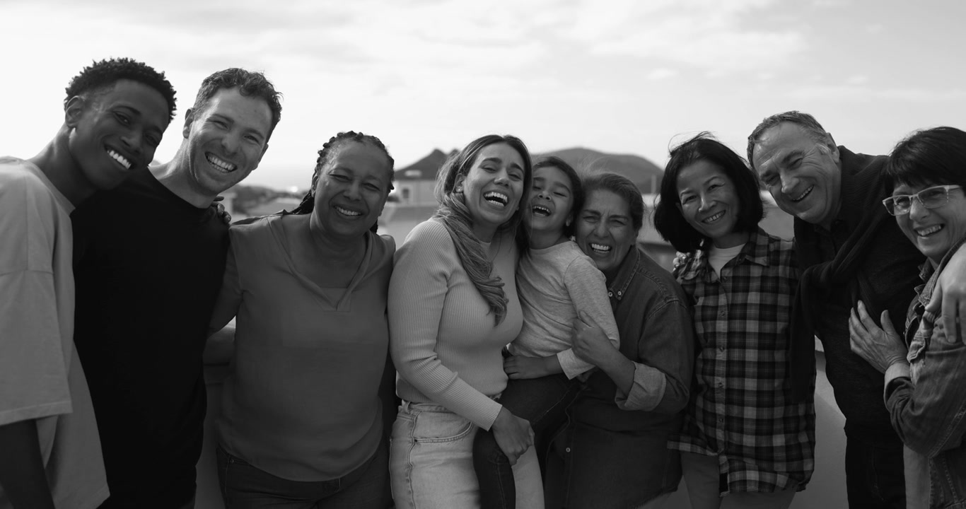 Joyful Diverse Group of People Laughing and Looking at Camera
