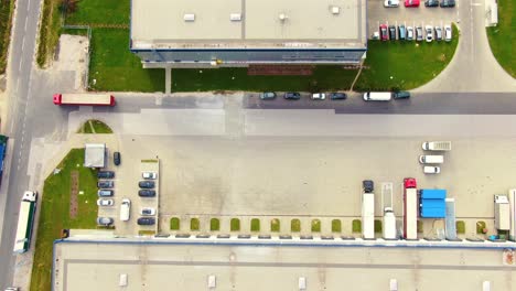 Aerial view of logistics center, warehouses near the highway