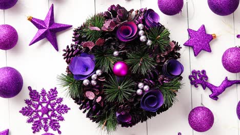 Christmas-Wreath-on-White-Wooden-Background