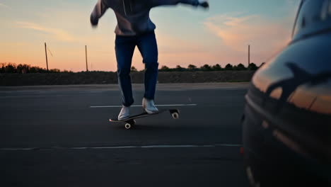 skateboarder performing tricks at sunset