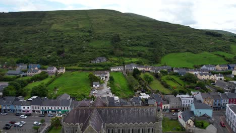 cahersiveen rural irish village and green hills in kerry county