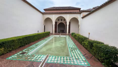 alcazaba malaga outside courtyard spain tourist attraction landmark swimming pool