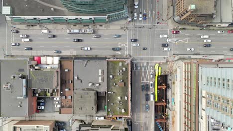 overhead view of rooftops and traffic on the streets in vancouver, bc, canada. - aerial shot