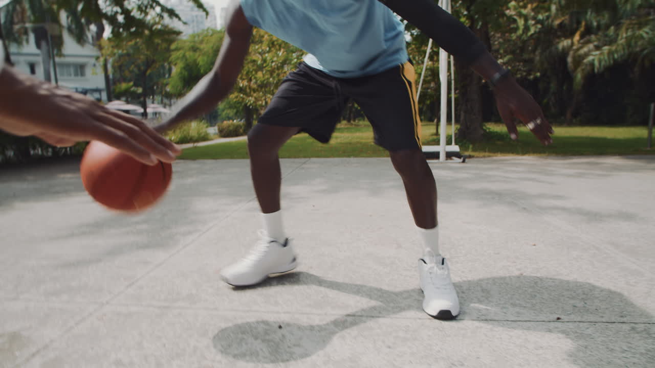 Male African American Athletes Playing Streetball