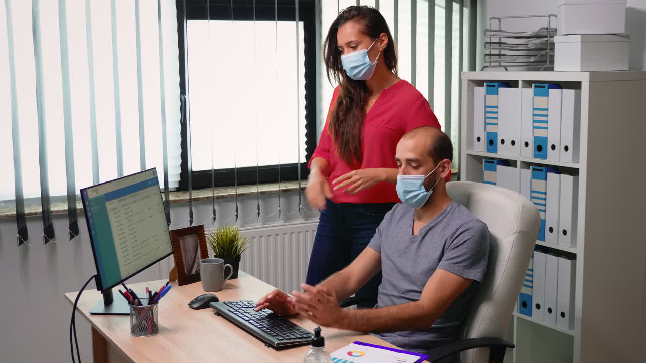 Young employees working in new office