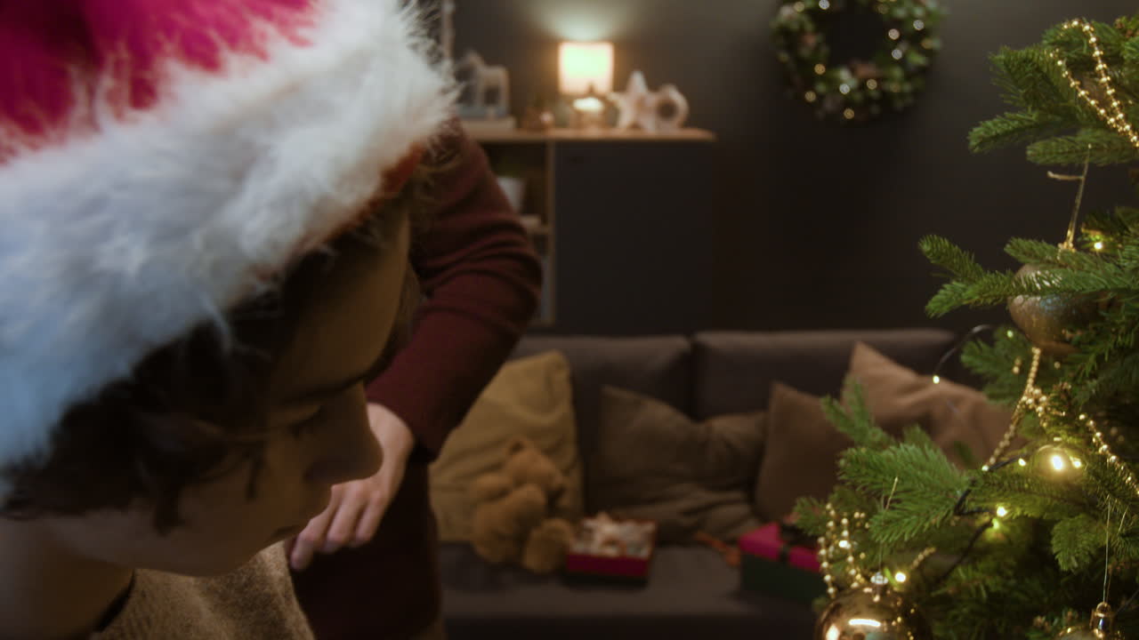 Christmas Decorations and People with Santa Hats