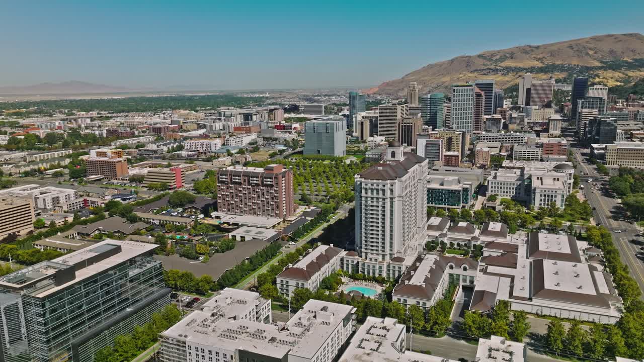 Salt Lake City Utah Skyline at Day, Mountains Behind, Aerial Drone
