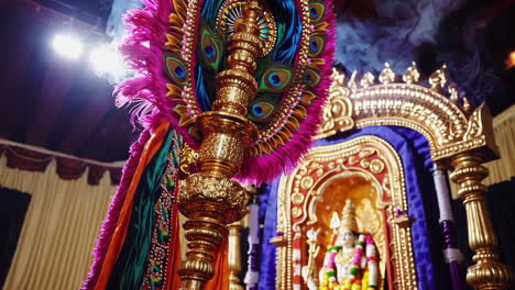 ornate decorated religious pole in a hindu temple