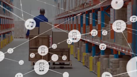 Animation-of-network-of-connections-over-man-working-in-warehouse