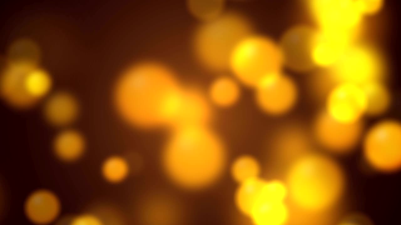 fondo dorado abstracto con luces bokeh brillantes. bucle sin costuras, 4k