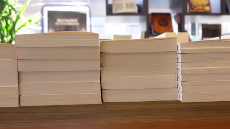 stacks of books in a bookstore