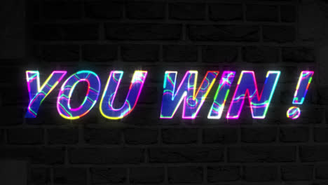 animation of you win text on dark background