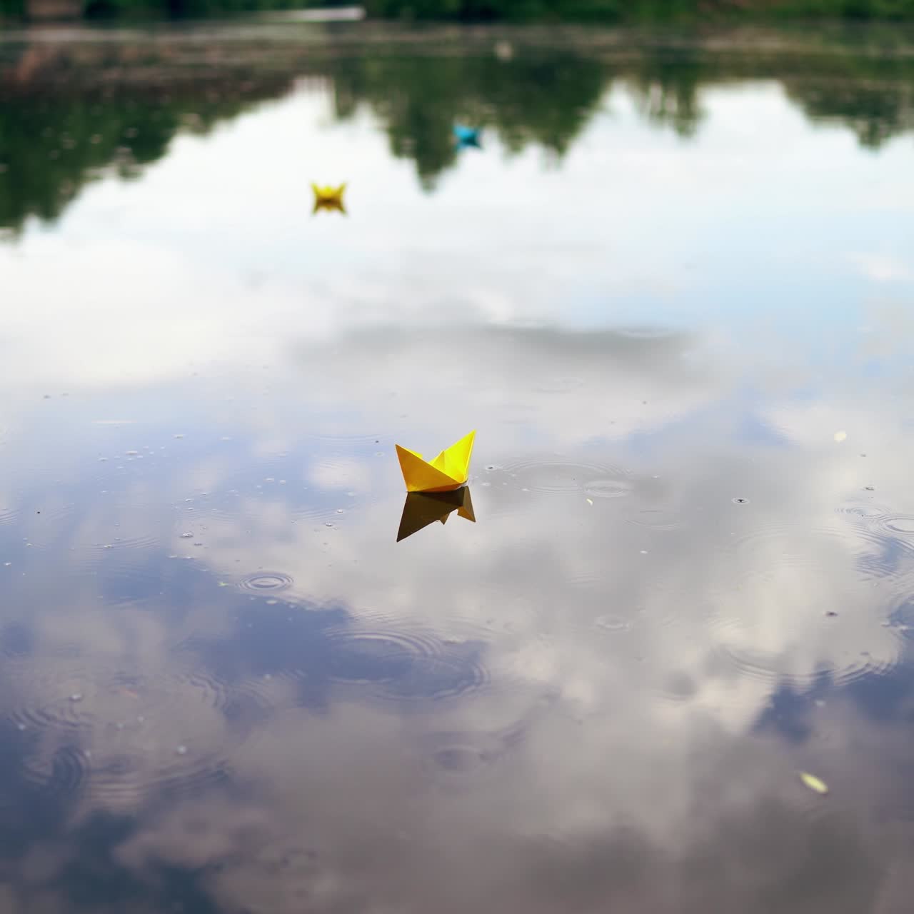 Paper boat is floating on the water
