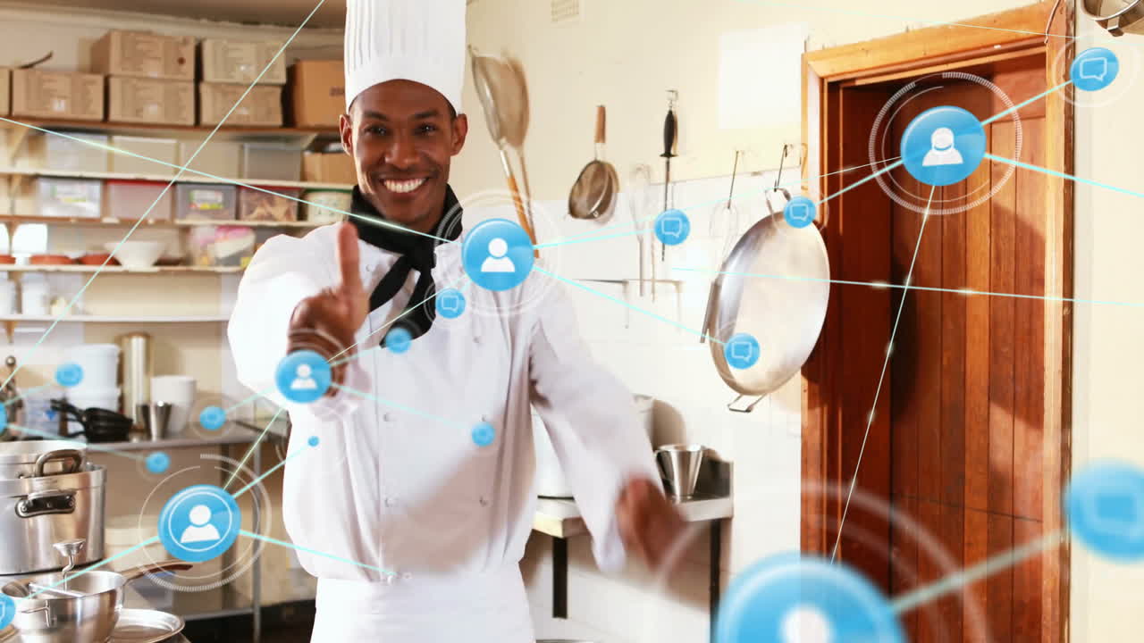 animación de la red de conexiones con iconos sobre afroamericano cocinero masculino en la cocina