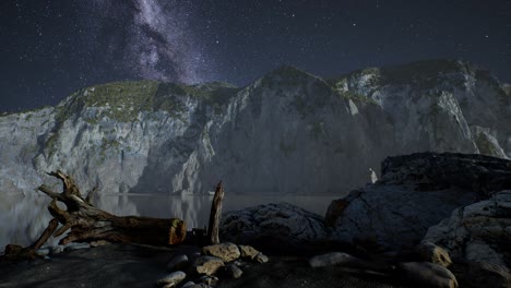 hyperlapse of night starry sky with mountain and ocean beach in lofoten norway