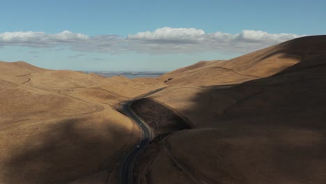 Aerial-shot-of-California-countryside-with-hills-with-perfect-blue-skies-and-clouds,-Concord-CA