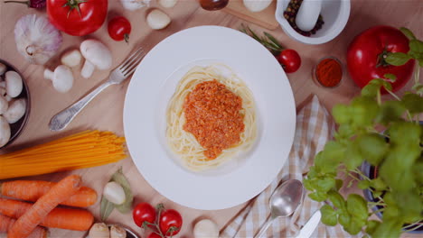preparing a delicious plate of spaghetti bolognese