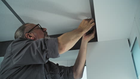 installing a security camera on the ceiling