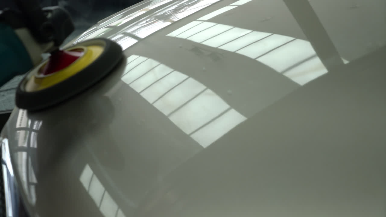 Polishing glass coating on car