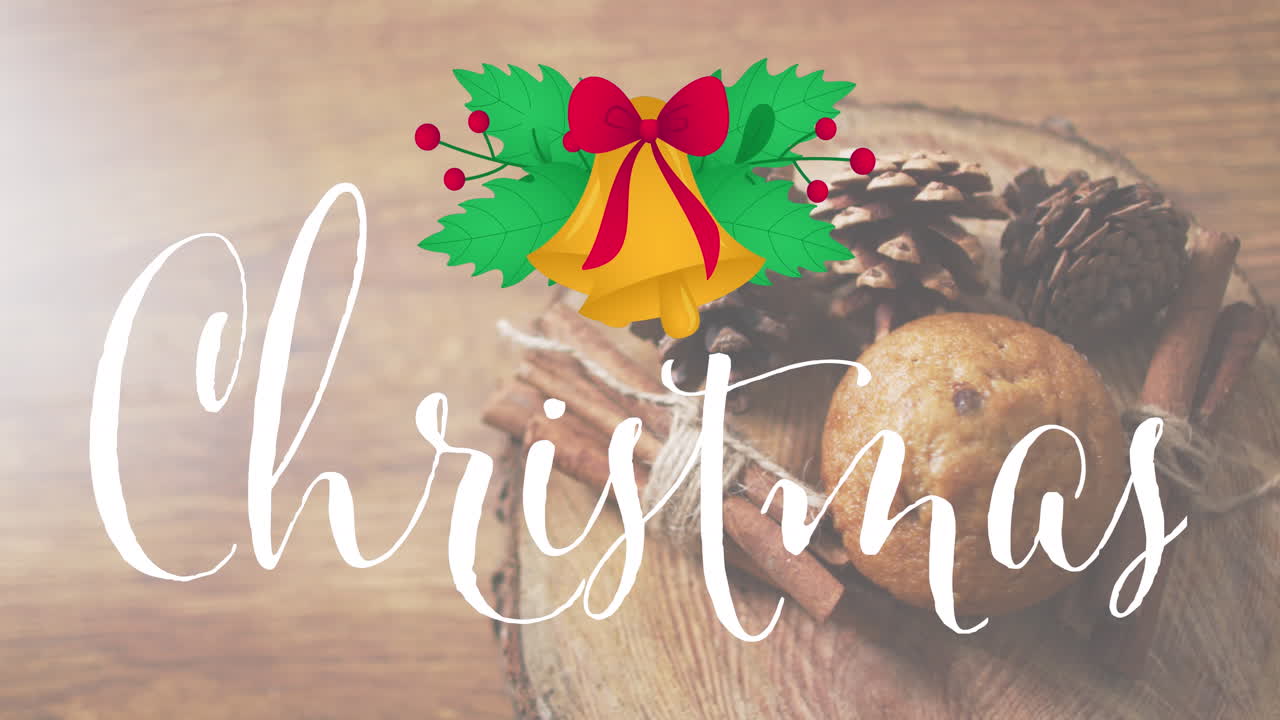 el video muestra el texto de navidad apareciendo sobre las campanas de navidad en un fondo negro.