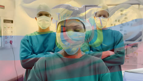 animation of flag of ecuador waving over surgeons in operating theatre