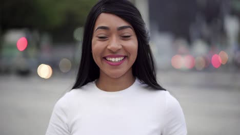 Closeup-shot-of-beautiful-young-woman-with-toothy-smile