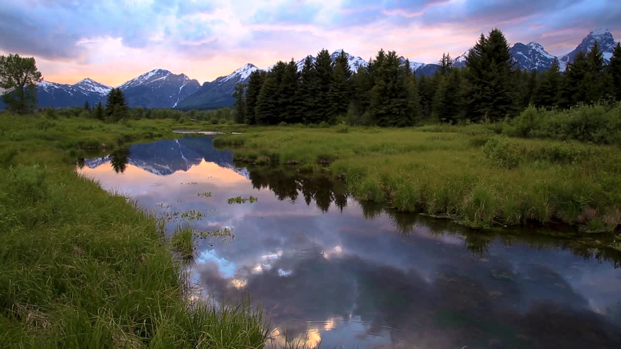 Sky, Mountain Peak And Forest Reflecting On River At Grand Teton National Park