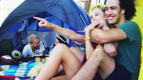 Couples-enjoying-and-relaxing-in-tent-4k