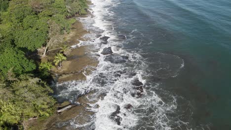 White-cap-waves-land-on-island-with-no-beach