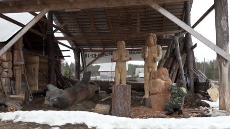 wood carving workshop in a winter setting