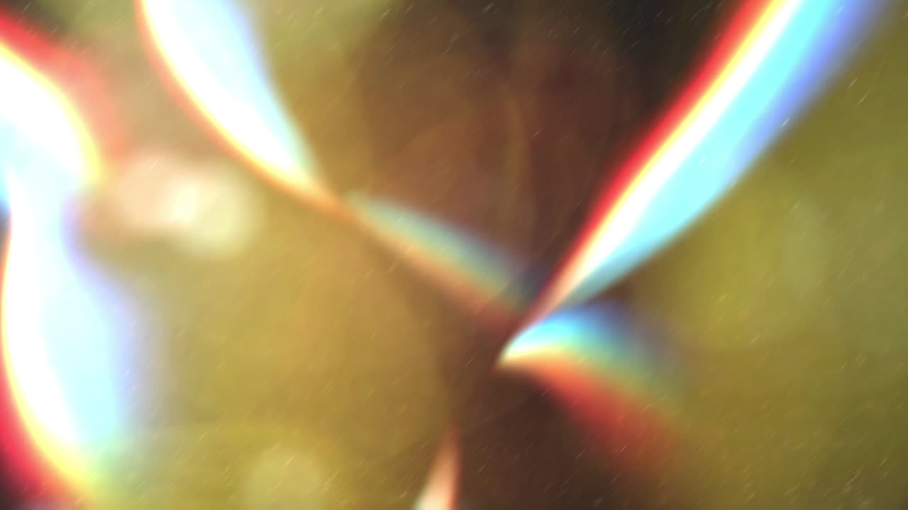 Effetti Astratti di Luce e Bagliori dell'Obiettivo con Grana di Pellicola Vintage