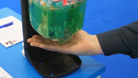 getting ear plugs from automatic earplug machine