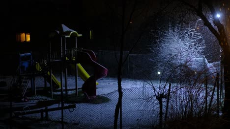 falling snow playground night