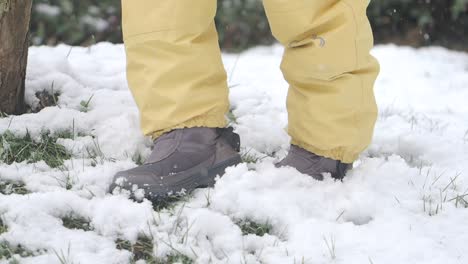 child walking in the snow