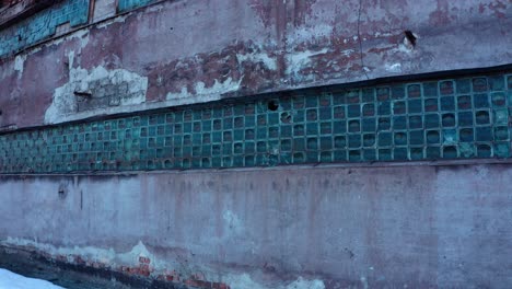 exterior of old abandoned industrial building with grungy walls in vlahita, romania